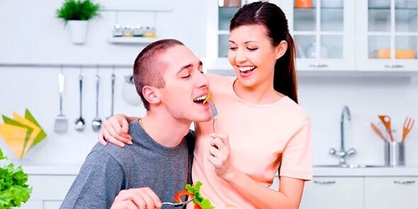 woman feeds man products to increase potency